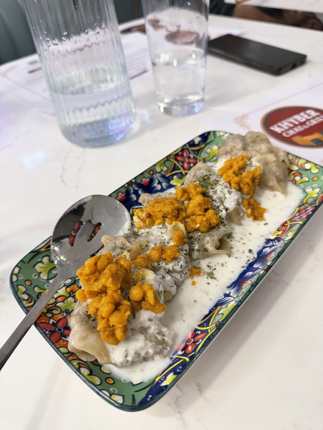 Mantu served with yogurt and lentil sauce at Khyber Surrey